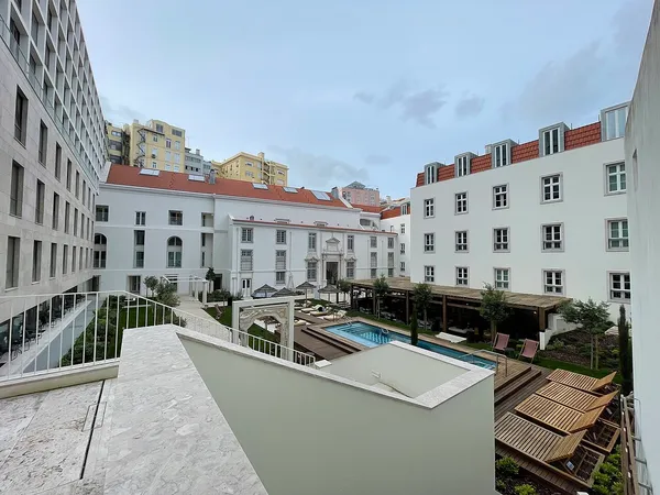Courtyard and pool of Locke de Santa Joana aparthotel in Lisbon