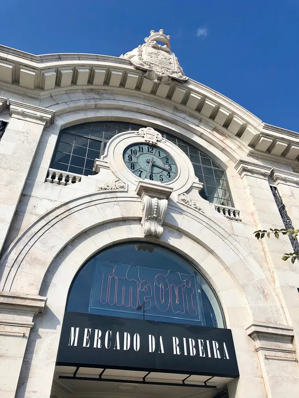 Time Out Market Lisboa (Mercado da Ribeira) historic facade with clock