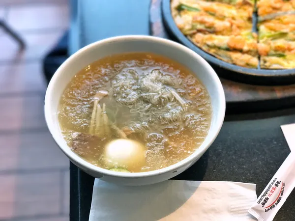 Mul naengmyeon (Korean cold noodle soup) with pajeon at Park's BBQ, Koreatown, Los Angeles