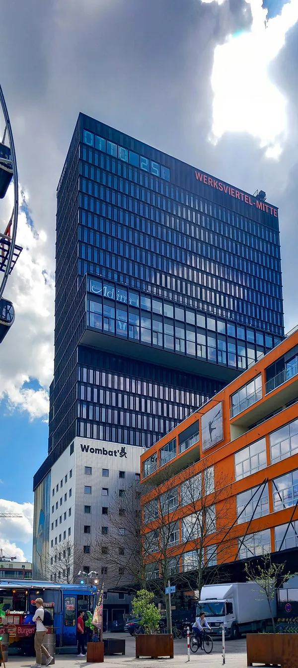 Adina Apartment Hotel Munich glass tower at Werksviertel-Mitte complex