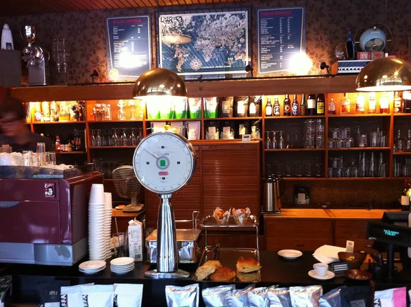 Vintage bar interior of Fuglen coffee shop in Oslo with retro Norwegian decor