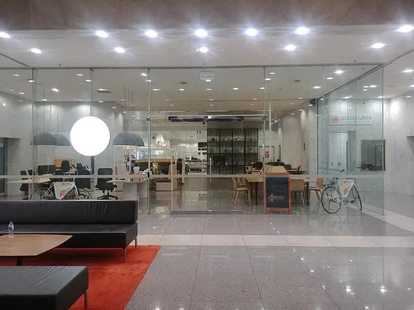 Glass-fronted entrance to Spacecubed (Riff) coworking space on St Georges Terrace, Perth