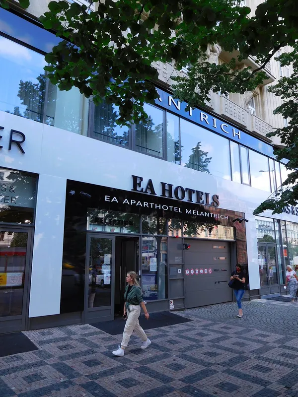EA ApartHotel Melantrich building on Wenceslas Square Prague showing EA Hotels branding