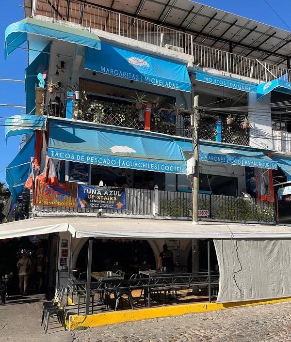Tuna Azul exterior with blue awnings and signage on Olas Altas, Puerto Vallarta