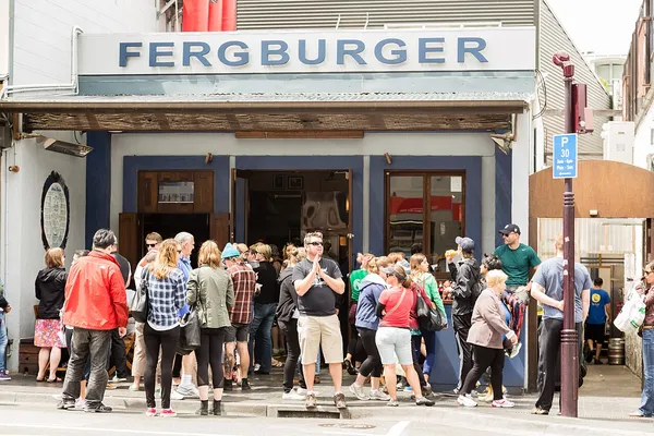 Fergburger storefront in Queenstown with crowds queuing outside