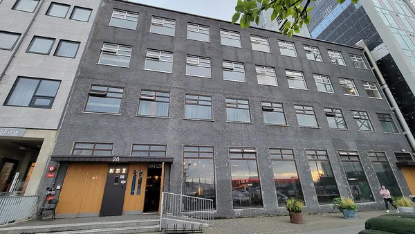 KEX Hostel building exterior in Reykjavik, grey multi-storey facade with KEX signage