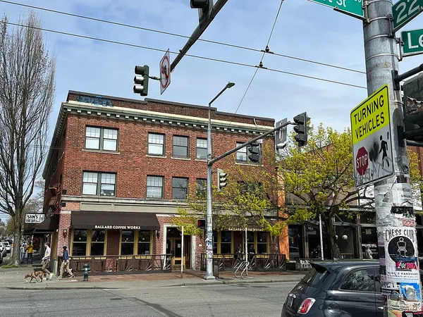 Ballard Coffee Works storefront on a brick corner building in Ballard, Seattle