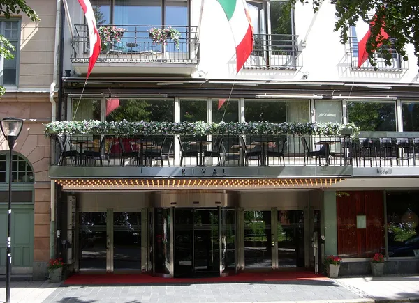 Facade of Hotel Rival at Mariatorget, Sodermalm, Stockholm, with illuminated marquee entrance