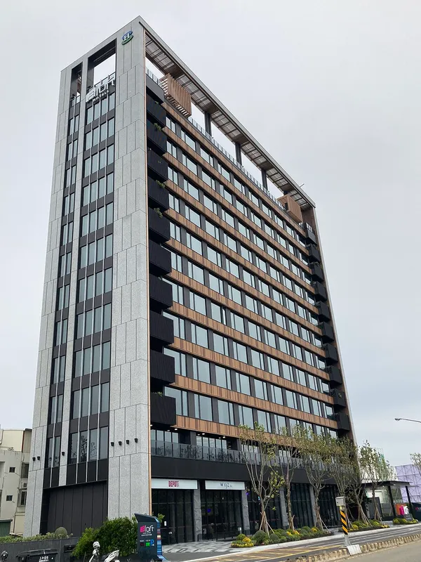 Aloft Tainan Anping hotel tower exterior with branded signage