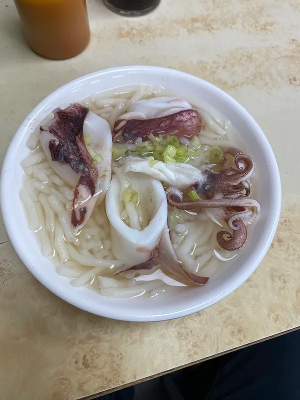 Bowl of squid calamari rice noodle soup from Yeh Jia in Tainan