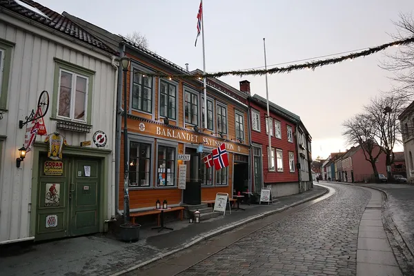 Baklandet Skydsstation exterior on cobblestone Bakklandet street, Trondheim