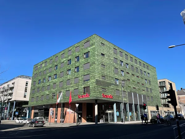 Scandic Solsiden hotel exterior, distinctive green tile facade with Scandic signage, Trondheim