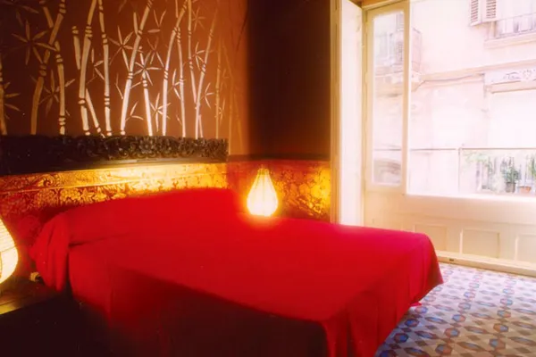 Themed room interior at Home Youth Hostel Valencia by Feetup Hostels