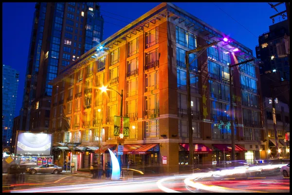 Opus Hotel Vancouver boutique hotel exterior at night in Yaletown